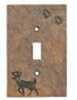 Hand-Cast Decorative Single Switch Cover. The Earth Tone Background Color Is Accented With a Deer And tracks Decoration. 3.25"X5"