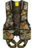 The Hunter Safety System Pro features a USB charging port allowing you to charge your device anywhere, dual bino/accessory straps, two zippered chest pockets and six cargo pockets. The Pro has ElimiSh...