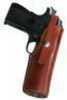 This 1920 Tom Threeperson's holster features a exposed trigger guard, foward cant, and a button strap.      
